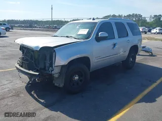 2011 GMC Yukon Denali with VIN 1GKS2EEF8BR346281, listed as a IAAI auction lot 42076037 with 264,311 mi miles. Bid and sale history available at carsss.com. Image 21.
