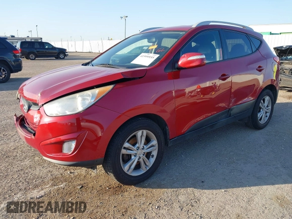2013 Hyundai Tucson GLS with VIN KM8JU3AC6DU763590, listed as a IAAI auction lot 41999555 with 149,960 mi miles. Bid and sale history available at carsss.com. Image 17.