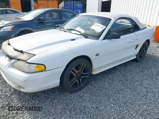 1994 Ford Mustang z VIN 1FALP45T2RF189589, wystawiony jako IAAI lot #42497220 z przebiegiem 98 565 mil mil oraz . Historia ofert i sprzedaży dostępna na DreamBid. Obrazek 2.