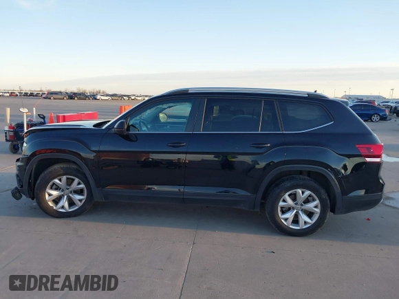 2018 Volkswagen Atlas SE with VIN 1V2DR2CA8JC536295, listed as a IAAI auction lot 41275322 with 166,684 mi miles and . Bid and sale history available at DreamBid. Image 14.