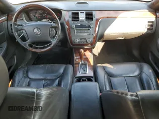 2007 Cadillac DTS Luxury I z VIN 1G6KD57Y87U135769, wystawiony jako Copart lot #53678095 z przebiegiem 134 052 mil mil oraz Nie do naprawy. Historia ofert i sprzedaży dostępna na DreamBid. Obrazek 8.