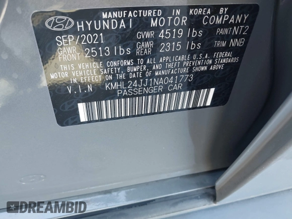 2022 Hyundai Sonata Hybrid Blue with VIN KMHL24JJ1NA041773, listed as a IAAI auction lot 41043553 with 23,696 mi miles. Bid and sale history available at carsss.com. Image 9.