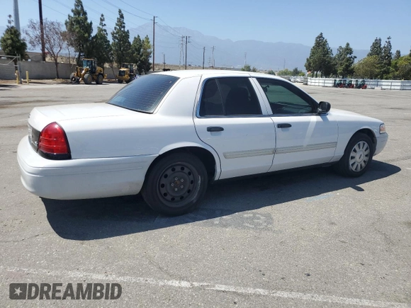 2011 Ford Police Interceptor with VIN 2FABP7BV4BX167977, listed as a Copart auction lot 61819025 with 104,769 mi miles and Salvage title. Bid and sale history available at DreamBid. Image 3.