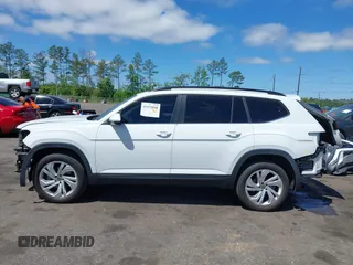 2021 Volkswagen Atlas SE z VIN 1V2WR2CA2MC529355, wystawiony jako IAAI lot #41972048 z przebiegiem 63 970 mil mil oraz . Historia ofert i sprzedaży dostępna na DreamBid. Obrazek 14.