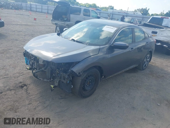 2020 Honda Civic LX with VIN 2HGFC2F65LH505932, listed as a IAAI auction lot 40046863 with 59,768 mi miles and . Bid and sale history available at DreamBid. Image 20.