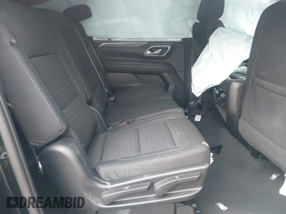 2023 Chevrolet Suburban LS with VIN 1GNSKBKD7PR110930, listed as a IAAI auction lot 41828617 with 132,214 mi miles and . Bid and sale history available at DreamBid. Image 8.