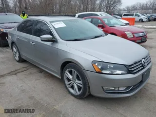 2014 Volkswagen Passat SEL Premium with VIN 1VWCS7A3XEC015097, listed as a IAAI auction lot 41593178 with 170,801 mi miles. Bid and sale history available at carsss.com. Image 1.