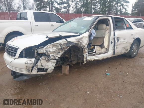 2002 Cadillac DeVille DHS z VIN 1G6KE57YX2U212020, wystawiony jako IAAI lot #41287342 z przebiegiem Nie podano mil oraz . Historia ofert i sprzedaży dostępna na DreamBid. Obrazek 17.