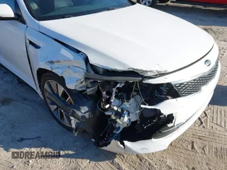 2016 Kia Optima SX Turbo with VIN 5XXGW4L2XGG084628, listed as a IAAI auction lot 41668592 with 116,535 mi miles and . Bid and sale history available at carsss.com. Image 6.