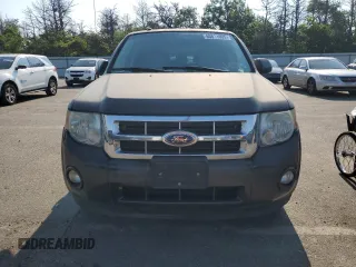 2011 Ford Escape Hybrid with VIN 1FMCU4K35BKA16469, listed as a Copart auction lot 65811905 with 401,583 mi miles and Clean title. Bid and sale history available at DreamBid. Image 5.