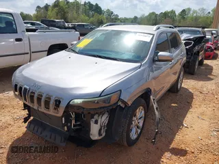 2019 Jeep Cherokee Latitude with VIN 1C4PJLCX7KD220799, listed as a IAAI auction lot 41970875 with 104,394 mi miles and . Bid and sale history available at DreamBid. Image 17.