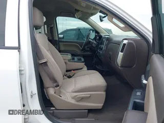 2018 Chevrolet Silverado 1500 LT with VIN 3GCPCREC7JG402401, listed as a IAAI auction lot 41880462 with 128,995 mi miles and . Bid and sale history available at DreamBid. Image 5.