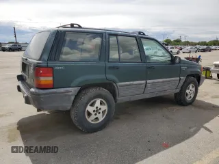 1993 Jeep Grand Cherokee Laredo with VIN 1J4GZ58Y8PC513026, listed as a Copart auction lot 57001465 with 135,242 mi miles and Clean title. Bid and sale history available at DreamBid. Image 3.