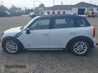 2015 MINI Countryman S with VIN WMWZC5C59FWM18935, listed as a IAAI auction lot 42427878 with 121,410 mi miles and . Bid and sale history available at DreamBid. Image 14.