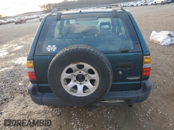 1999 Isuzu Rodeo S with VIN 4S2CK58W2X4312468, listed as a Copart auction lot 85753294 with Not Provided miles and Salvage Title. Bid and sale history available at DreamBid. Image 6.