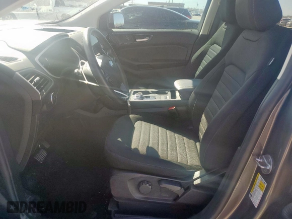 2021 Ford Edge SE z VIN 2FMPK3G94MBA46090, wystawiony jako Copart lot #49350915 z przebiegiem 99 324 mil mil oraz Czysty tytuł • Clean title. Historia ofert i sprzedaży dostępna na DreamBid. Obrazek 7.