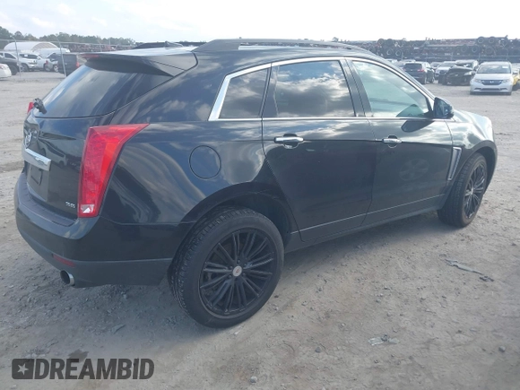 2014 Cadillac SRX z VIN 3GYFNAE35ES652370, wystawiony jako IAAI lot #40984924 z przebiegiem 211 588 mil mil oraz . Historia ofert i sprzedaży dostępna na DreamBid. Obrazek 4.