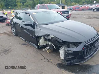 2021 Audi RS 7 z VIN WUAPCBF26MN902755, wystawiony jako IAAI lot #40370895 z przebiegiem 28 690 mil mil oraz . Historia ofert i sprzedaży dostępna na DreamBid. Obrazek 1.