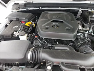 2023 Jeep Wrangler Sport S with VIN 1C4HJXDN3PW682572, listed as a Copart auction lot 68643135 with 14,621 mi miles and Salvage title. Bid and sale history available at DreamBid. Image 16.