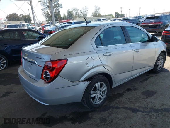 2013 Chevrolet Sonic LT with VIN 1G1JC5SB2D4243632, listed as a IAAI auction lot 42072421 with 40,289 mi miles and . Bid and sale history available at DreamBid. Image 4.