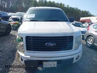 2014 Ford F-150 XL with VIN 1FTFW1EF2EFB93610, listed as a IAAI auction lot 41515501 with 211,415 mi miles and . Bid and sale history available at DreamBid. Image 12.
