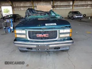 1997 GMC Sierra 1500 z VIN 2GTEK19RXV1501674, wystawiony jako Copart lot #59061595 z przebiegiem 138 998 mil mil oraz Szkoda całkowita • Salvage title. Historia ofert i sprzedaży dostępna na DreamBid. Obrazek 5.