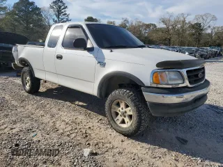 2003 Ford F-150 XL with VIN 1FTRX18L13NB64579, listed as a Copart auction lot 49496705 with 258,499 mi miles and Salvage Title. Bid and sale history available at carsss.com. Image 4.