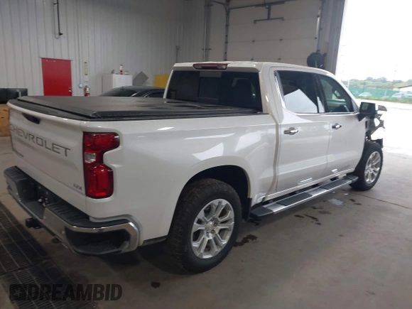 2023 Chevrolet Silverado 1500 LTZ with VIN 1GCUDGEDXPZ100414, listed as a IAAI auction lot 40005559 with 40,000 mi miles and . Bid and sale history available at DreamBid. Image 4.