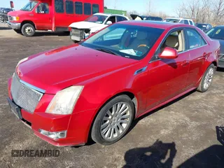 2011 Cadillac CTS Premium with VIN 1G6DS5ED7B0133154, listed as a IAAI auction lot 41822033 with 121,862 mi miles. Bid and sale history available at carsss.com. Image 2.
