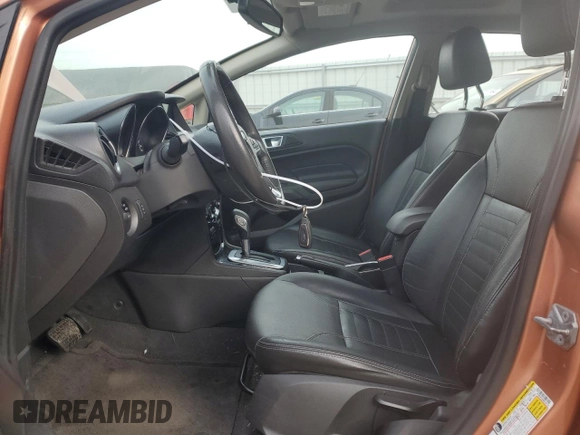 2017 Ford Fiesta Titanium with VIN 3FADP4FJ8HM164132, listed as a Copart auction lot 82577424 with 63,686 mi miles and Salvage Title. Bid and sale history available at DreamBid. Image 7.
