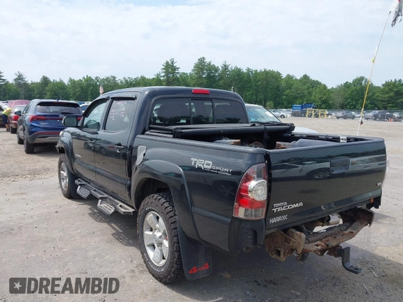 2013 Toyota Tacoma with VIN 3TMLU4EN4DM117239, listed as a IAAI auction lot 42494359 with 239,635 mi miles and . Bid and sale history available at DreamBid. Image 3.