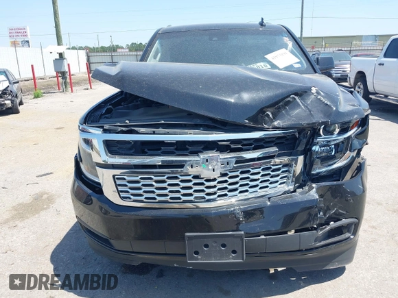 2020 Chevrolet Tahoe LS with VIN 1GNSCAKCXLR293278, listed as a IAAI auction lot 41973191 with 61,907 mi miles and . Bid and sale history available at DreamBid. Image 12.