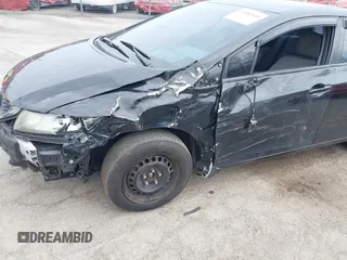 2014 Honda Civic LX z VIN 19XFB2F58EE200464, wystawiony jako IAAI lot #42081440 z przebiegiem 163 785 mil mil oraz . Historia ofert i sprzedaży dostępna na DreamBid. Obrazek 22.