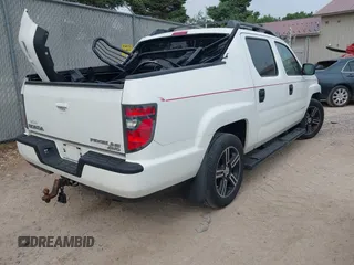 2013 Honda Ridgeline RTL with VIN 5FPYK1F58DB018542, listed as a IAAI auction lot 42465817 with 112,898 mi miles and . Bid and sale history available at DreamBid. Image 4.