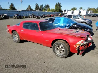 1975 Pontiac Firebird z VIN 2U87S5N582923, wystawiony jako Copart lot #72821784 z przebiegiem 37 718 mil mil oraz Tytuł czysty. Historia ofert i sprzedaży dostępna na DreamBid. Obrazek 4.