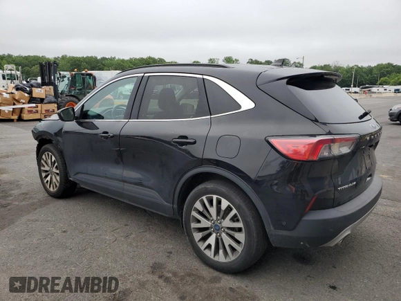 2021 Ford Escape Titanium with VIN 1FMCU9J97MUA58524, listed as a Copart auction lot 61045765 with 91,575 mi miles and Clean title. Bid and sale history available at DreamBid. Image 2.