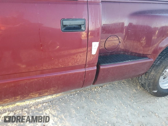 1989 GMC Sierra 1500 with VIN 1GTDC14HXKZ548889, listed as a Copart auction lot 74876684 with 205,365 mi miles and Salvage Title. Bid and sale history available at DreamBid. Image 12.