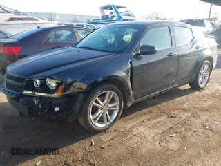 2012 Dodge Avenger SXT with VIN 1C3CDZCB2CN228306, listed as a IAAI auction lot 41833238 with 140,065 mi miles and . Bid and sale history available at carsss.com. Image 2.