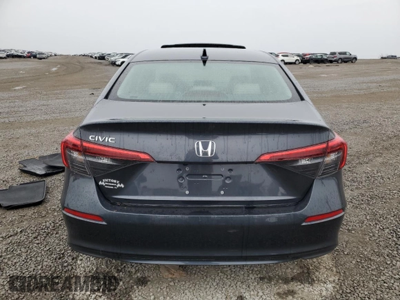 2024 Honda Civic EX z VIN 2HGFE1F79RH336732, wystawiony jako Copart lot #43025295 z przebiegiem 5 468 mil mil oraz Szkoda całkowita • Salvage title. Historia ofert i sprzedaży dostępna na DreamBid. Obrazek 6.