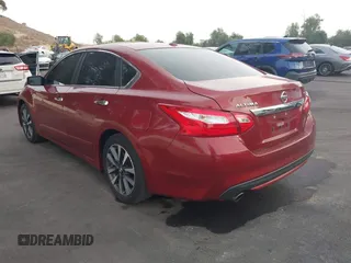 2016 Nissan Altima SR with VIN 1N4AL3AP5GC219124, listed as a IAAI auction lot 41170014 with 101,650 mi miles and . Bid and sale history available at carsss.com. Image 3.