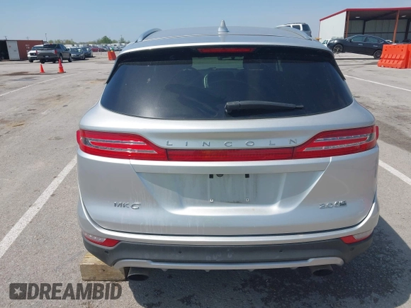 2015 Lincoln MKC with VIN 5LMCJ2A94FUJ16038, listed as a IAAI auction lot 42057400 with 102,848 mi miles. Bid and sale history available at carsss.com. Image 6.