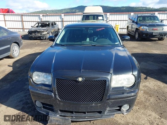 2006 Chrysler 300 C SRT8 with VIN 2C3LA73W06H370568, listed as a IAAI auction lot 41982346 with 133,209 mi miles. Bid and sale history available at carsss.com. Image 12.