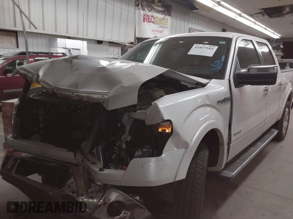 2013 Ford F-150 XL with VIN 1FTFW1CTXDKE87139, listed as a IAAI auction lot 41857584 with 156,837 mi miles and . Bid and sale history available at carsss.com. Image 2.