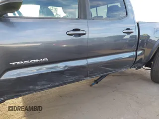 2021 Toyota Tacoma SR5 z VIN 3TMDZ5BN6MM110938, wystawiony jako IAAI lot #41838703 z przebiegiem 67 680 mil mil oraz . Historia ofert i sprzedaży dostępna na DreamBid. Obrazek 6.
