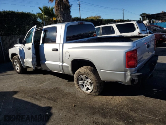 2007 Dodge Dakota SLT with VIN 1D7HE48K47S103248, listed as a Copart auction lot 82744094 with 126,126 mi miles and Salvage Title. Bid and sale history available at DreamBid. Image 2.