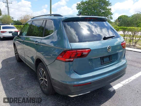 2019 Volkswagen Tiguan SE with VIN 3VV3B7AX8KM171057, listed as a IAAI auction lot 42209509 with 99,437 mi miles and . Bid and sale history available at DreamBid. Image 3.