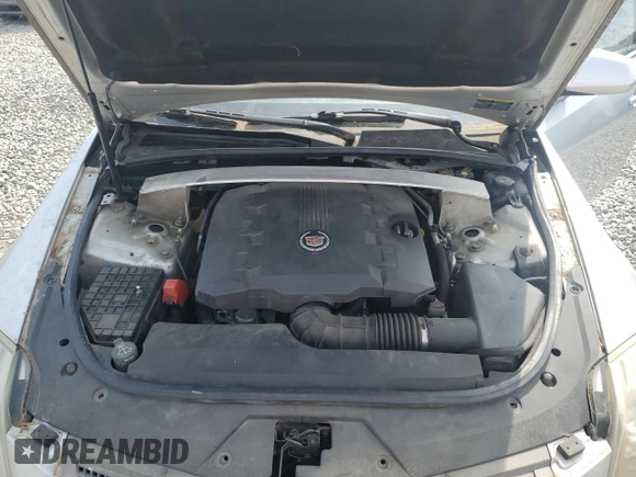 2010 Cadillac CTS z VIN 1G6DA5EG1A0114269, wystawiony jako Copart lot #54386895 z przebiegiem 157 471 mil mil oraz Szkoda całkowita • Salvage title. Historia ofert i sprzedaży dostępna na DreamBid. Obrazek 11.