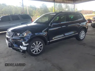 2017 Volkswagen Touareg Sport with VIN WVGEF7BP8HD000237, listed as a Copart auction lot 52714074 with 107,463 mi miles and . Bid and sale history available at DreamBid. Image 1.
