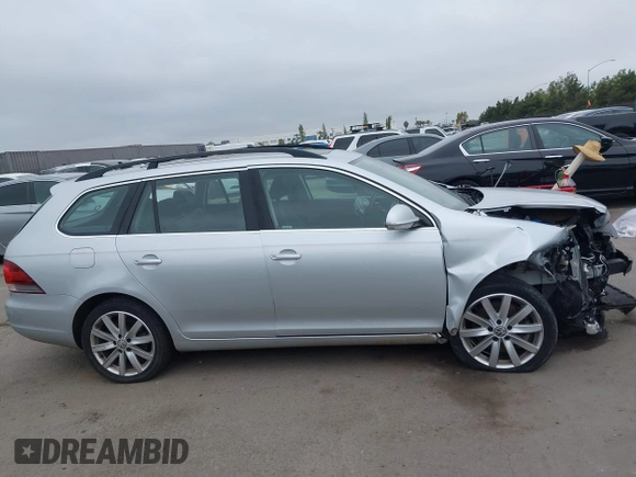 2012 Volkswagen Jetta TDI w/Sunroof & Nav z VIN 3VWPL7AJ5CM713304, wystawiony jako IAAI lot #42374538 z przebiegiem 124 648 mil mil oraz . Historia ofert i sprzedaży dostępna na DreamBid. Obrazek 13.