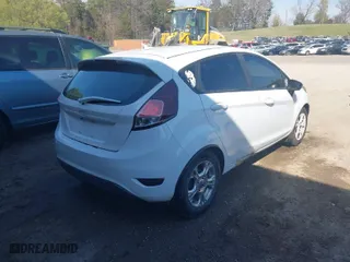 2016 Ford Fiesta SE with VIN 3FADP4EJ3GM105361, listed as a IAAI auction lot 41911637 with 323,508 mi miles. Bid and sale history available at carsss.com. Image 4.